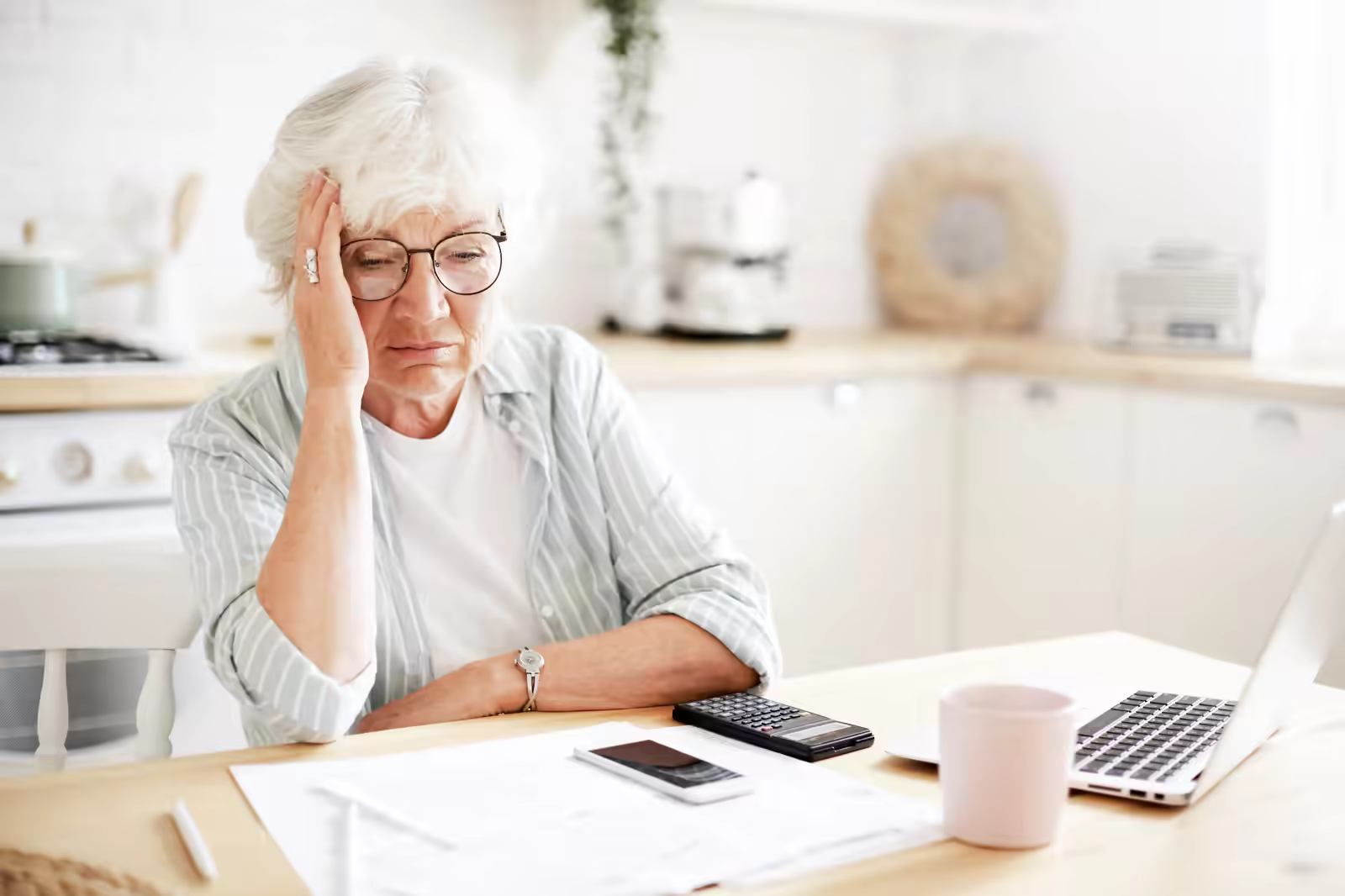 Patient reviewing a surprise ambulance bill with a look of concern