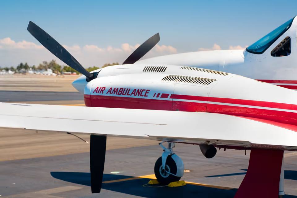 Fixed-wing air ambulance aircraft on a tarmac ready for patient transport
