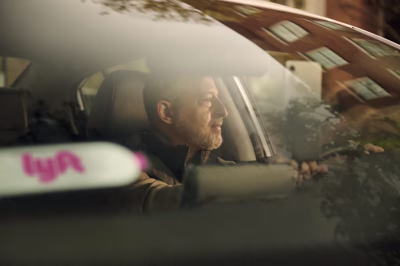 Lyft vehicle arriving to transport a patient outside a hospital entrance