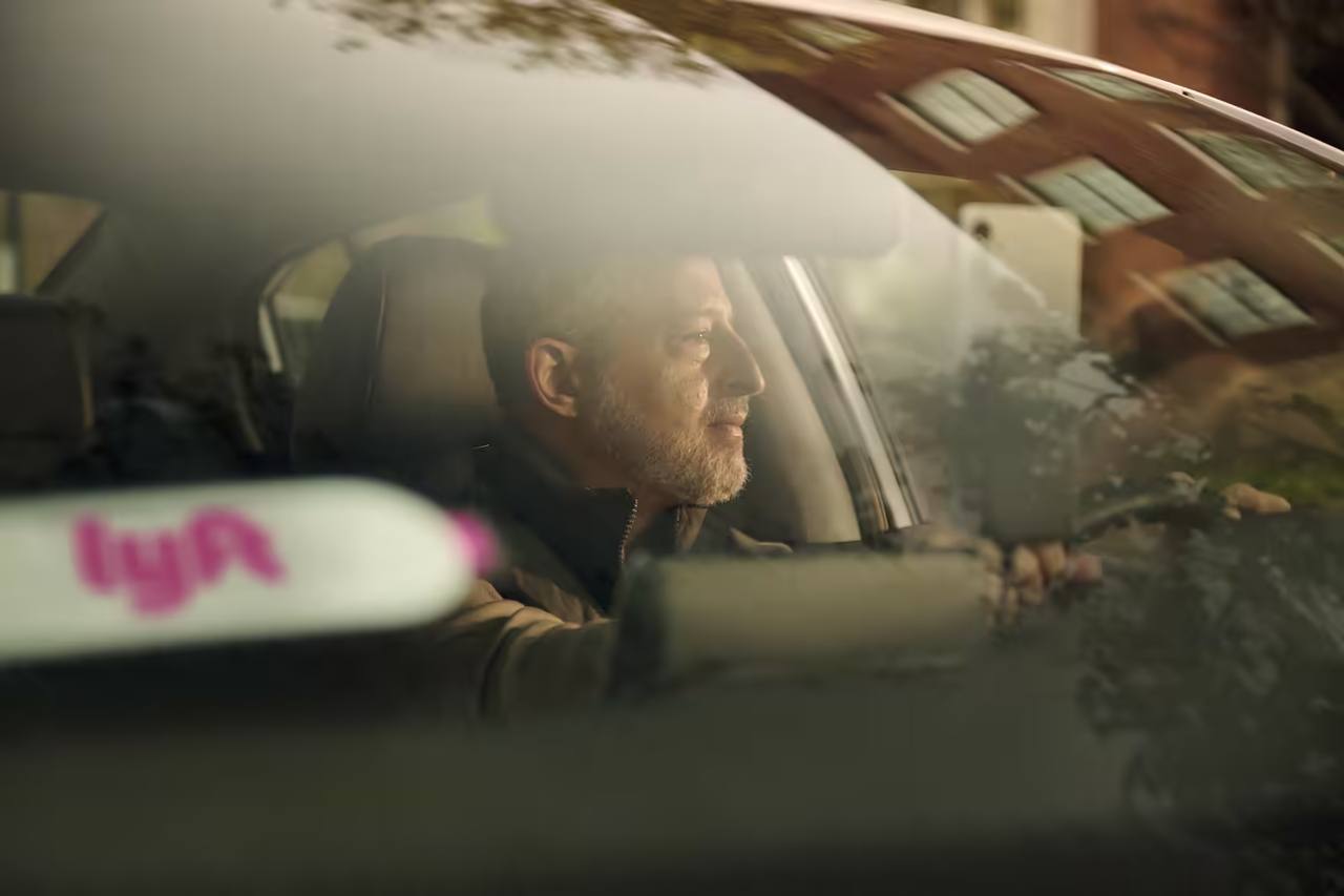 Lyft driver at the wheel of a car