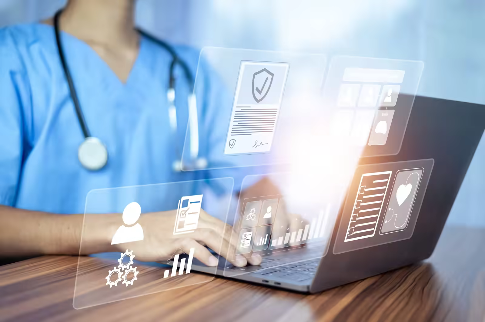 Hospital administrator looking relieved while reviewing streamlined workflow on a computer